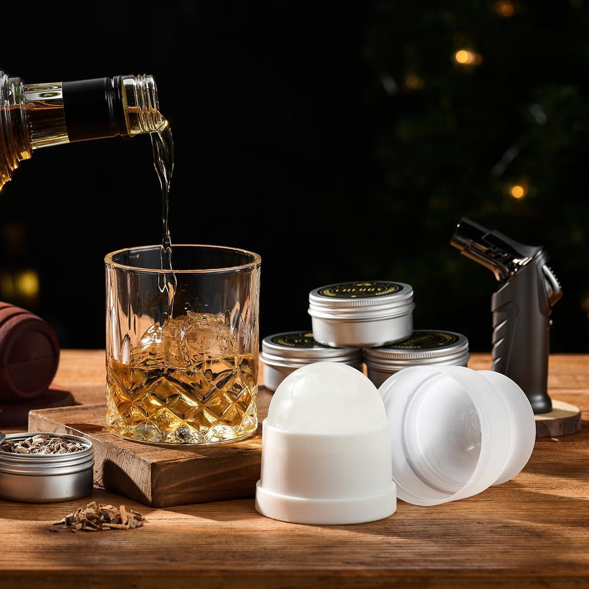 Two ice ball moulds and whisky glass